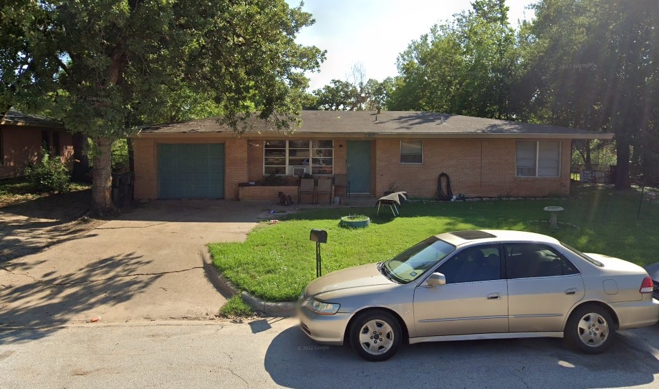 Tbd Truman Street Bryan, TX 77801 - Photo 9 of 13 a car parked in front of a house