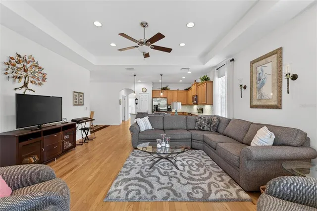 a view of walk in closet with clothes
