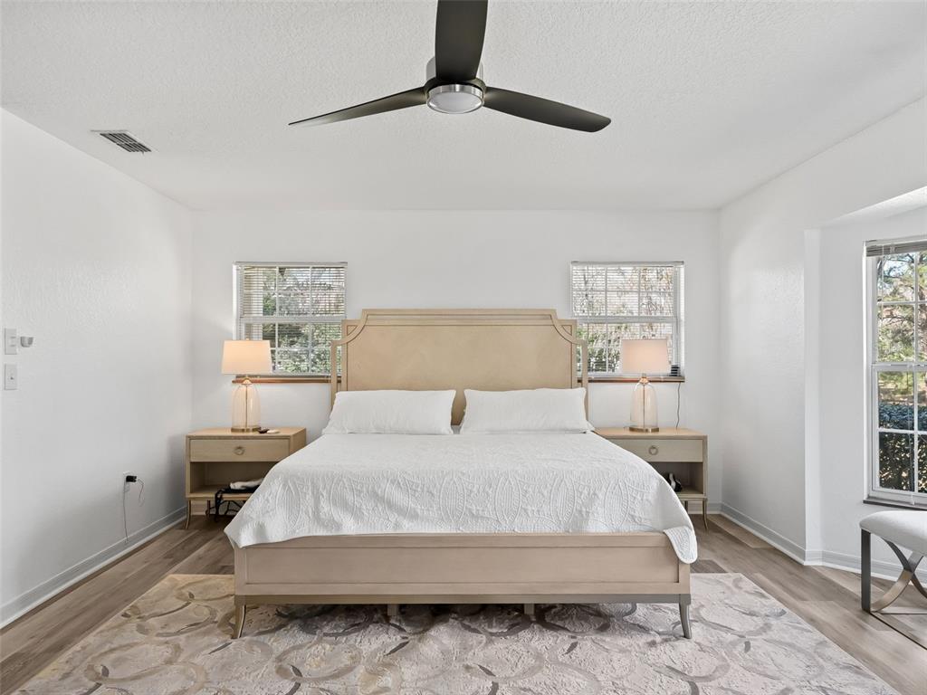 8916 Southwest 8th Street Ocala, FL 34481 - Photo 16 of 40 a bedroom with a bed and a window