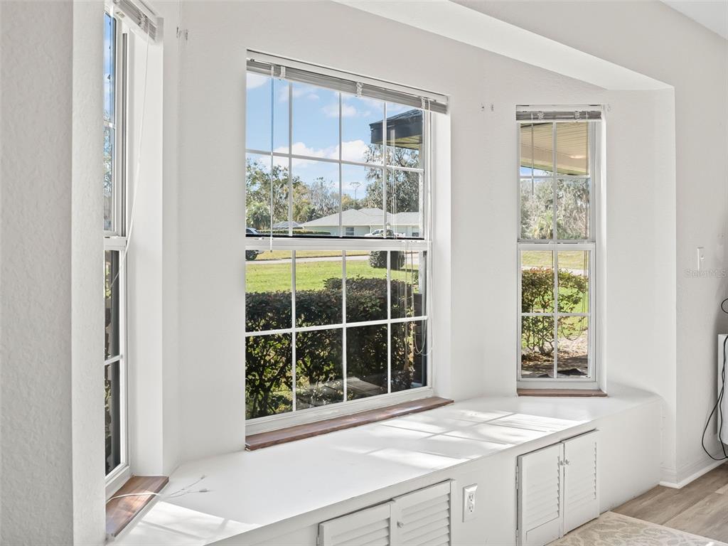 8916 Southwest 8th Street Ocala, FL 34481 - Photo 19 of 40 a view of a kitchen that has a sink and a window in it