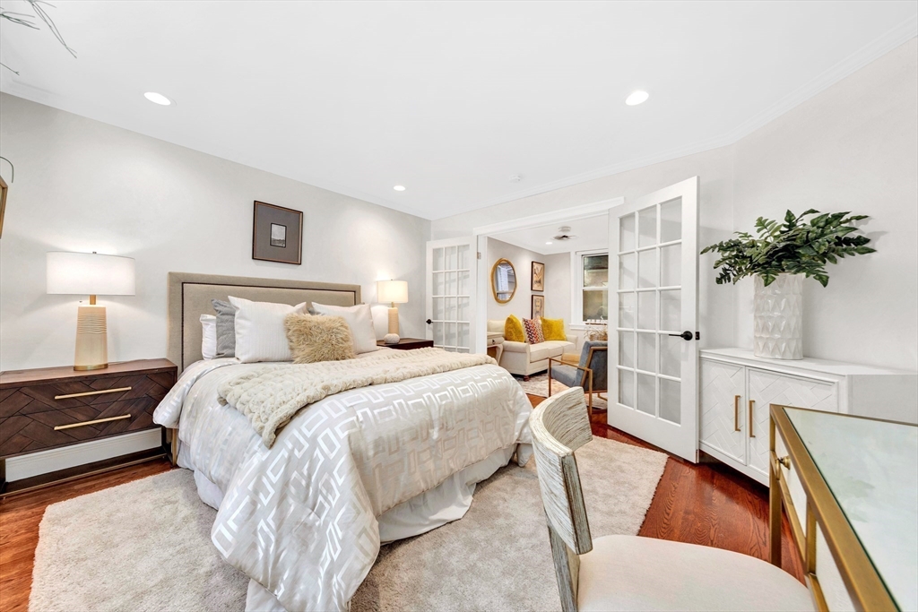 34 Clark Street, Unit 2 Boston, MA 02113 - Photo 11 of 23 a bedroom with a bed and a potted plant