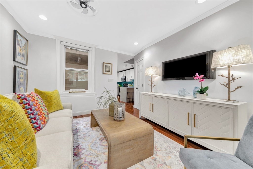 34 Clark Street, Unit 2 Boston, MA 02113 - Photo 2 of 23 a living room with furniture and a flat screen tv