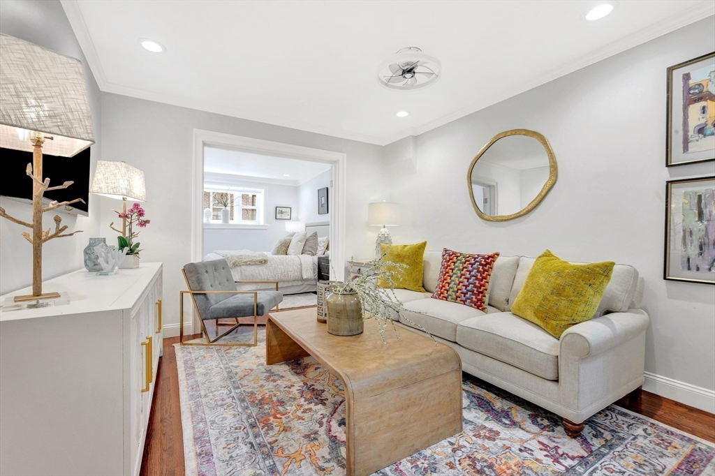 34 Clark Street, Unit 2 Boston, MA 02113 - Photo 3 of 23 a living room with furniture a flat screen tv and a large window