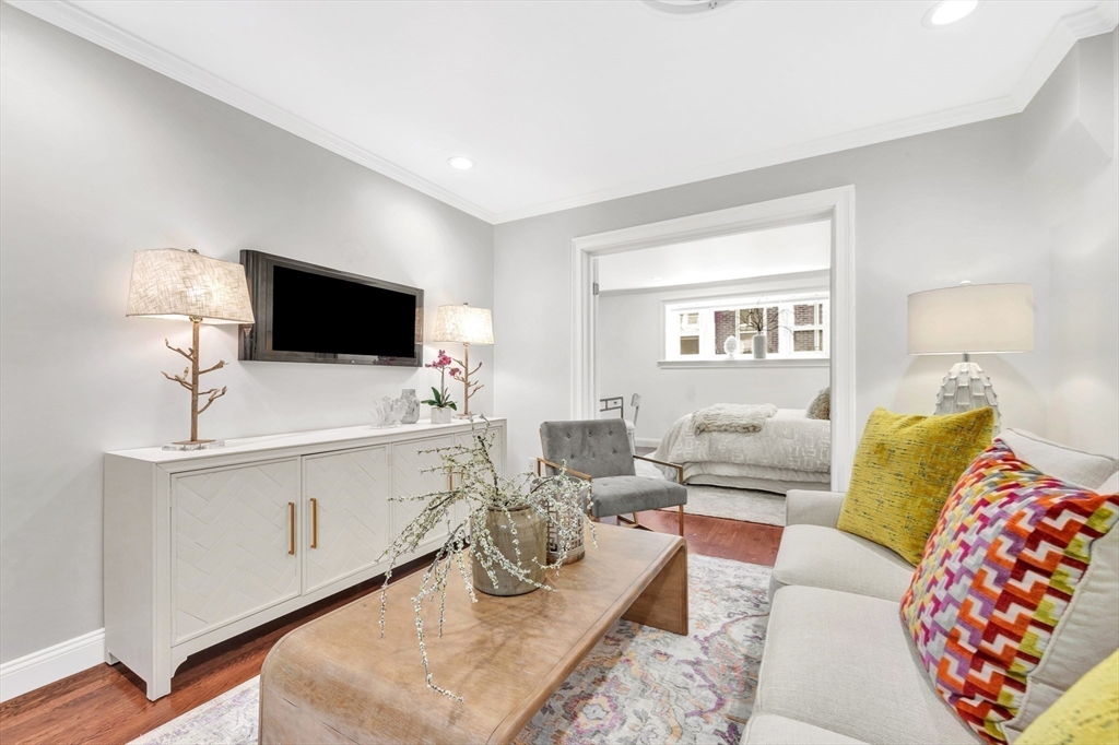 34 Clark Street, Unit 2 Boston, MA 02113 - Photo 4 of 23 a living room with furniture and a flat screen tv