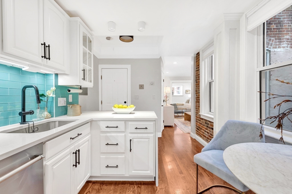 34 Clark Street, Unit 2 Boston, MA 02113 - Photo 8 of 23 a kitchen with cabinets appliances and furniture