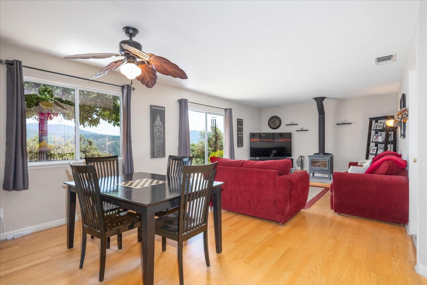 41175 Jean Road West Oakhurst, CA 93644 - Photo 14 of 43 a view of a livingroom with furniture window and wooden floor