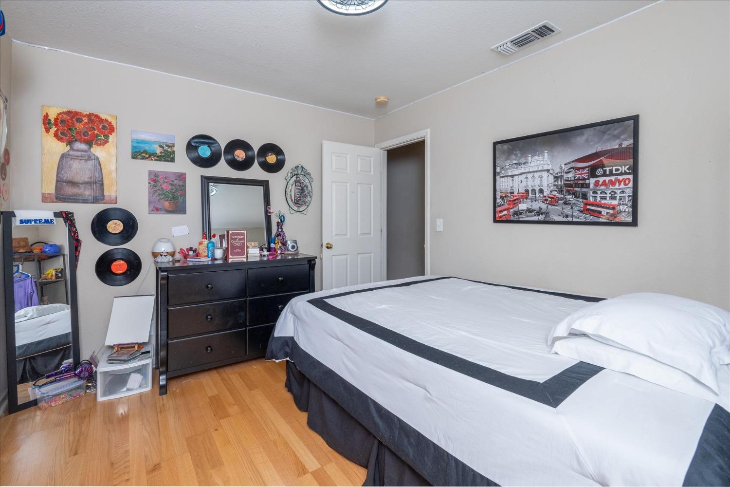 41175 Jean Road West Oakhurst, CA 93644 - Photo 28 of 43 a bedroom with a bed and a dresser