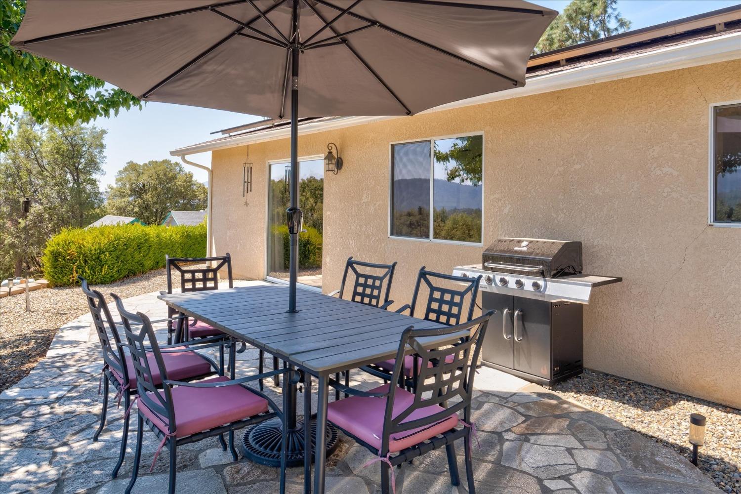 41175 Jean Road West Oakhurst, CA 93644 - Photo 34 of 43 a view of an outside dining space with furniture
