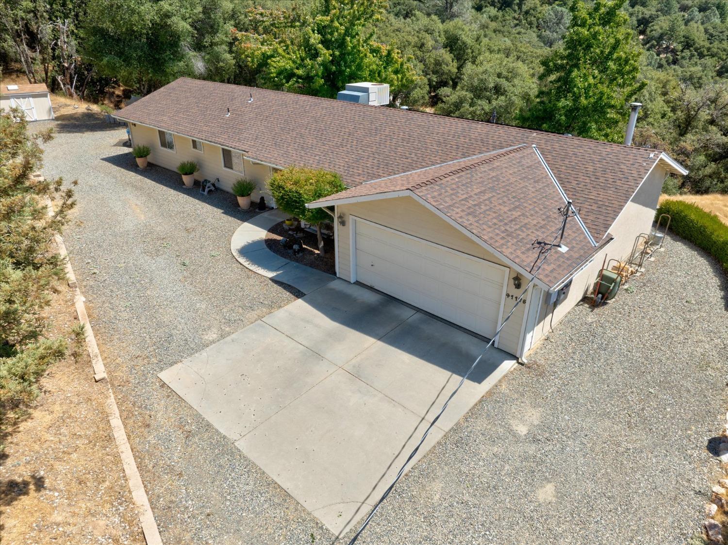 41175 Jean Road West Oakhurst, CA 93644 - Photo 6 of 43 an aerial view of a house