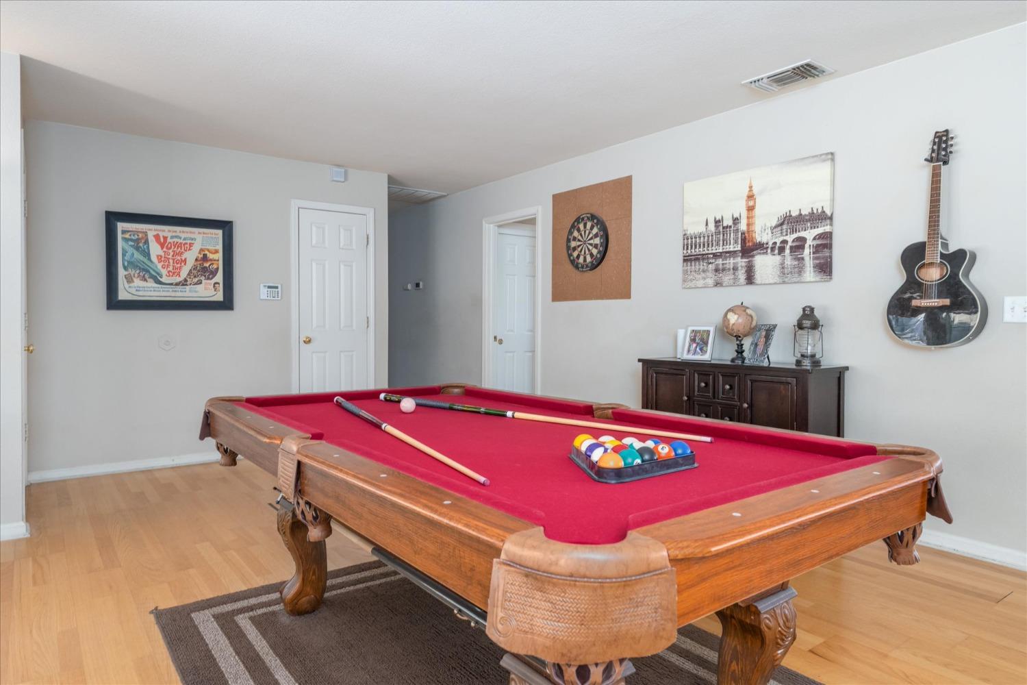 41175 Jean Road West Oakhurst, CA 93644 - Photo 10 of 43 a room with pool table and wall paintings
