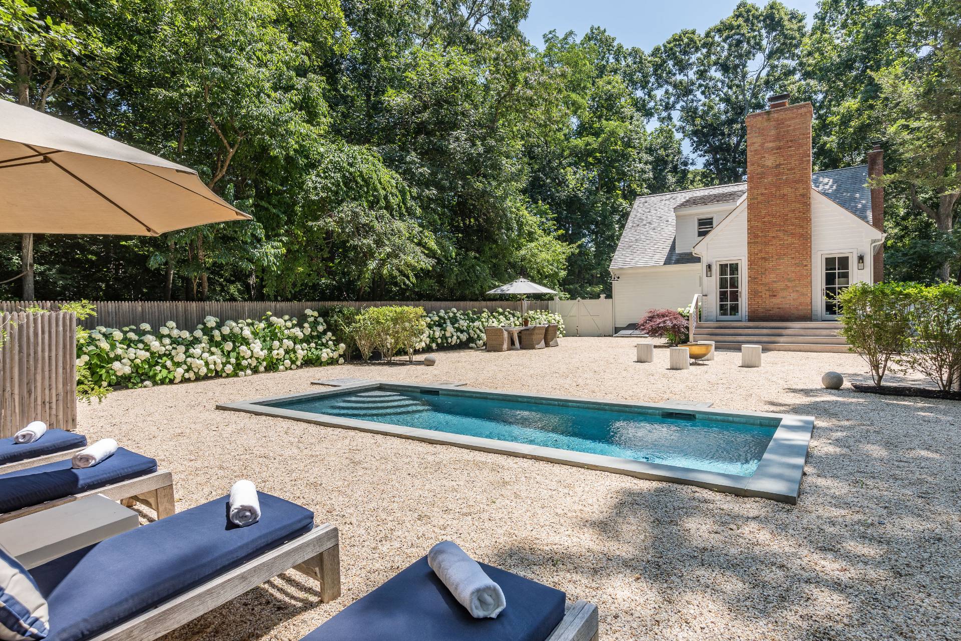 1253 Brick Kiln Road Sag Harbor, NY 11963 - Photo 13 of 31 swimming pool view with a seating space