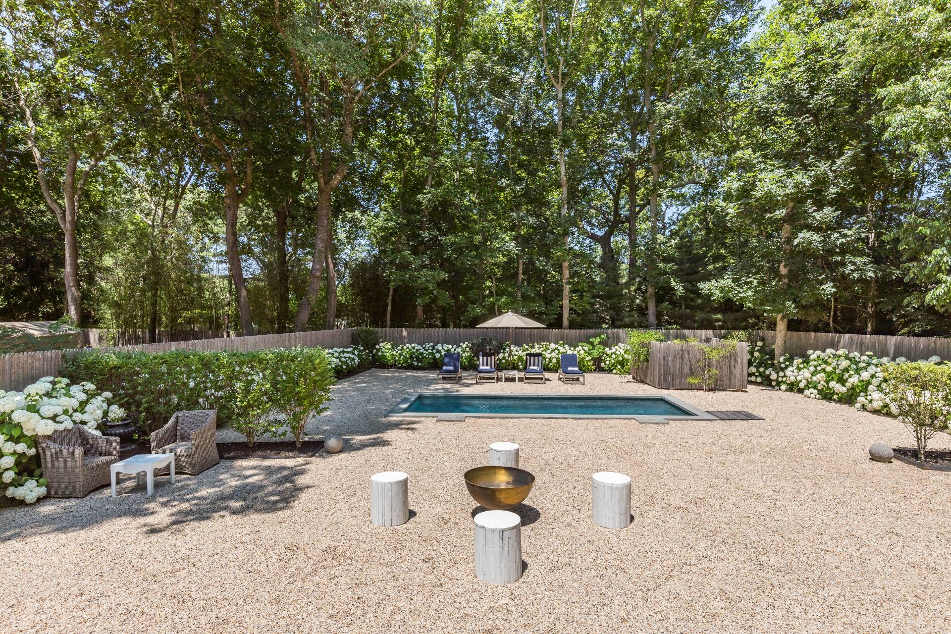 1253 Brick Kiln Road Sag Harbor, NY 11963 - Photo 18 of 31 a view of a backyard with sitting area