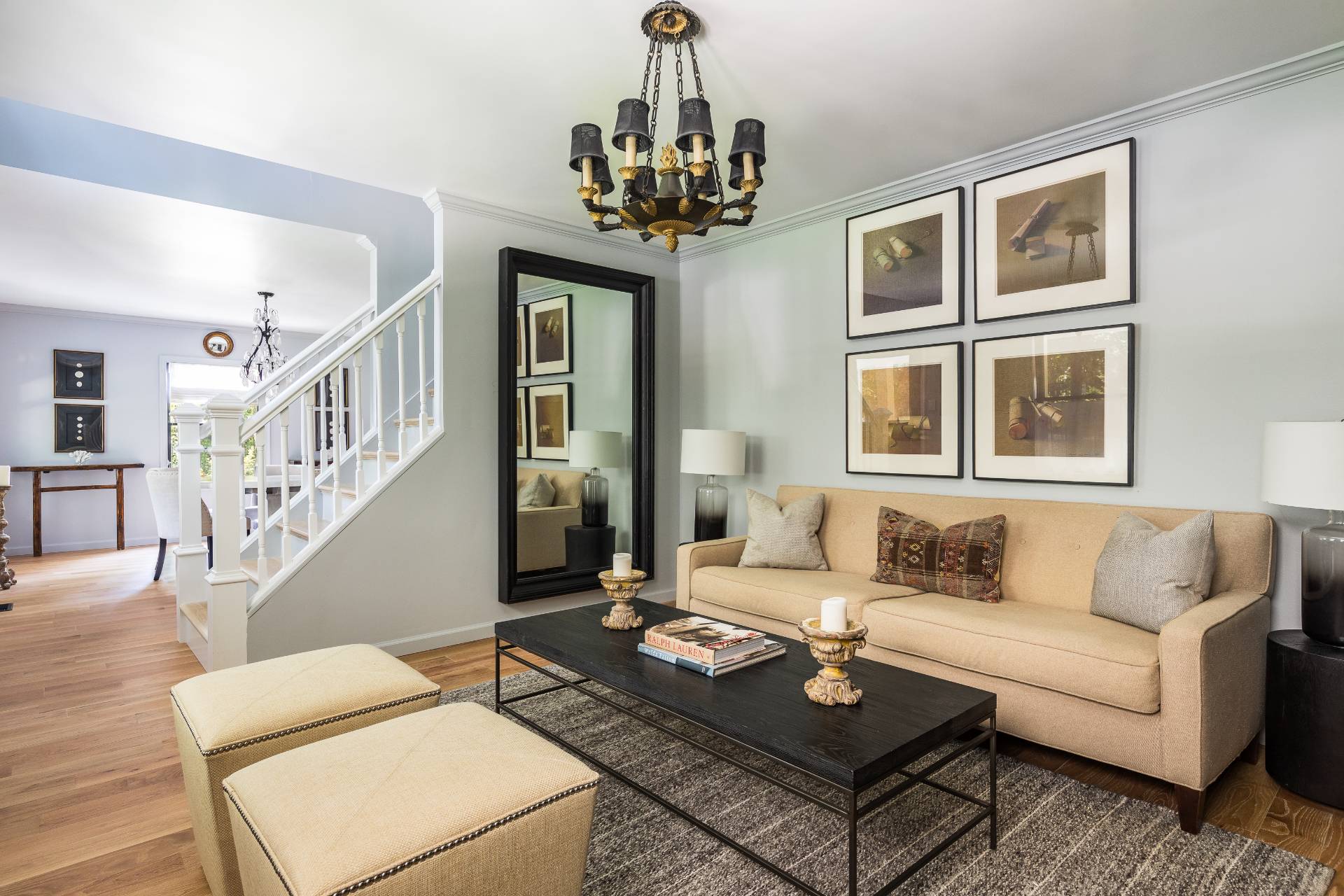 1253 Brick Kiln Road Sag Harbor, NY 11963 - Photo 25 of 31 a living room with furniture a chandelier and a dining table