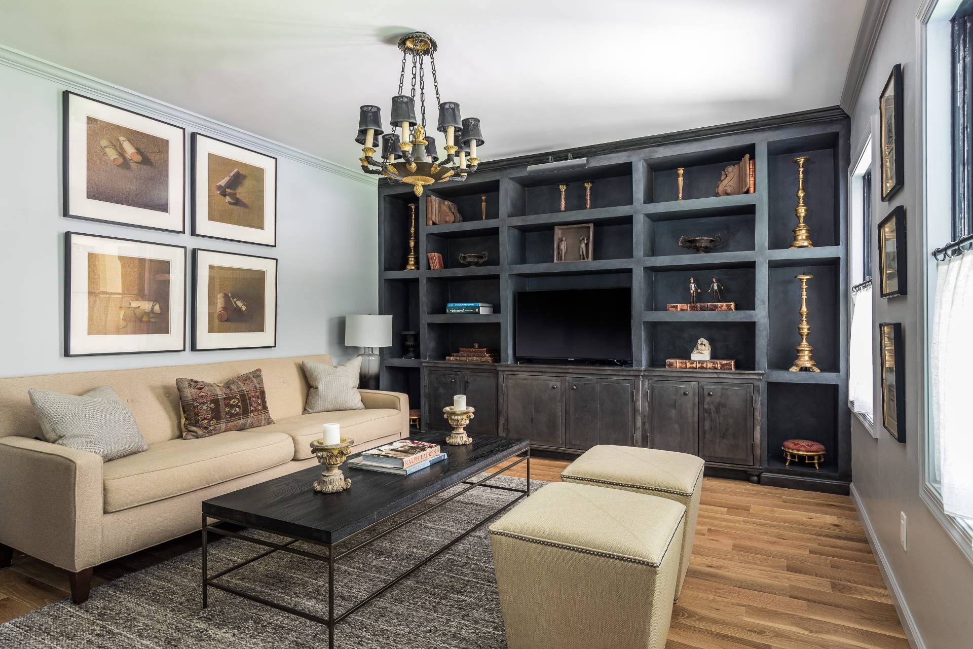 1253 Brick Kiln Road Sag Harbor, NY 11963 - Photo 26 of 31 a living room with furniture a chandelier and a rug