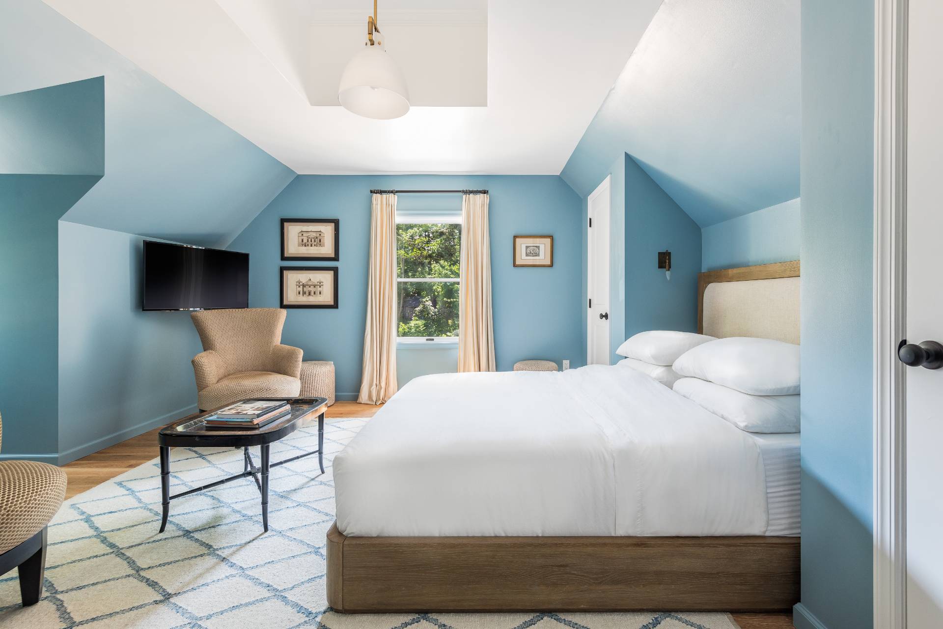 1253 Brick Kiln Road Sag Harbor, NY 11963 - Photo 29 of 31 a bedroom with a bed and chair