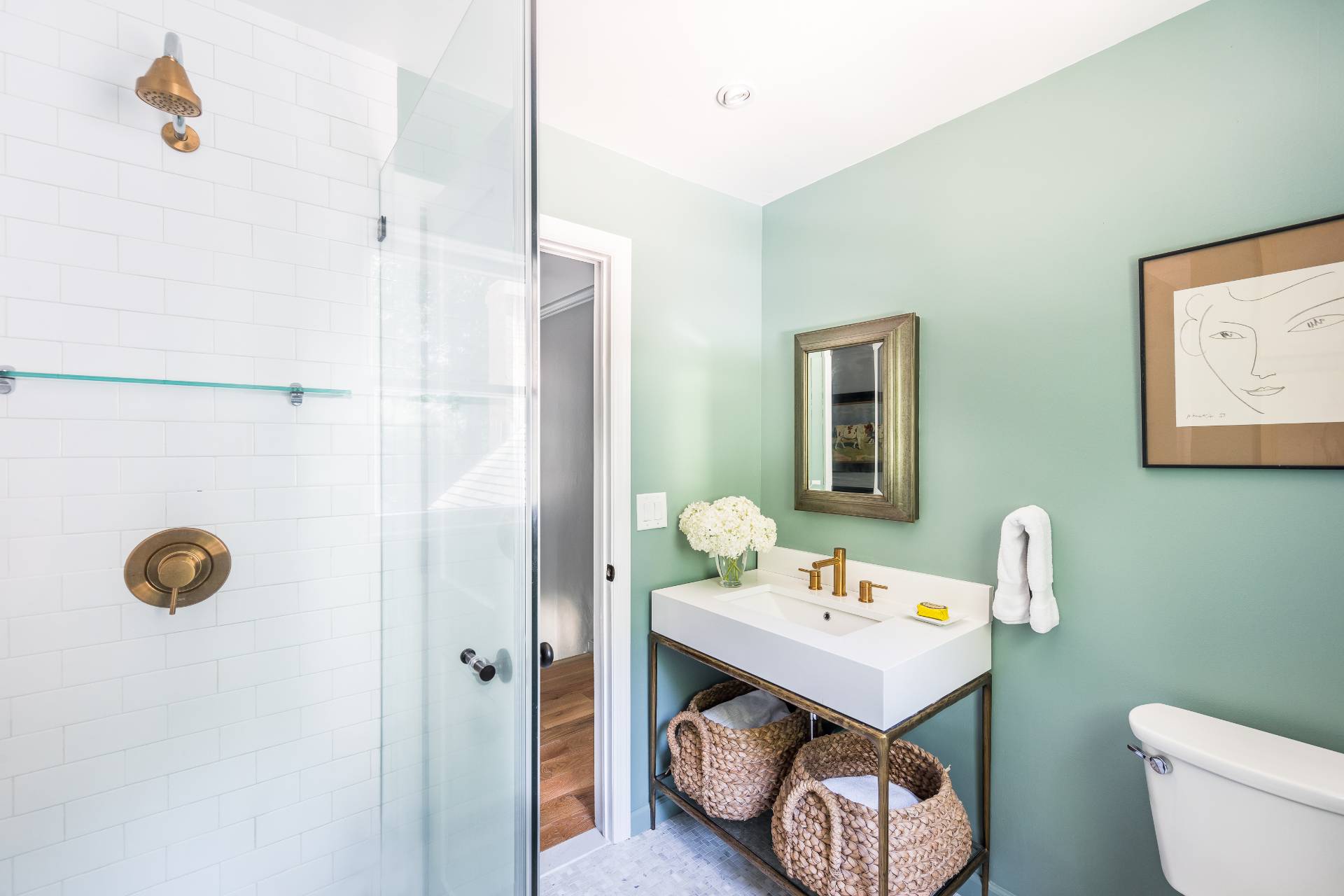 1253 Brick Kiln Road Sag Harbor, NY 11963 - Photo 30 of 31 a bathroom with a sink mirror and toilet