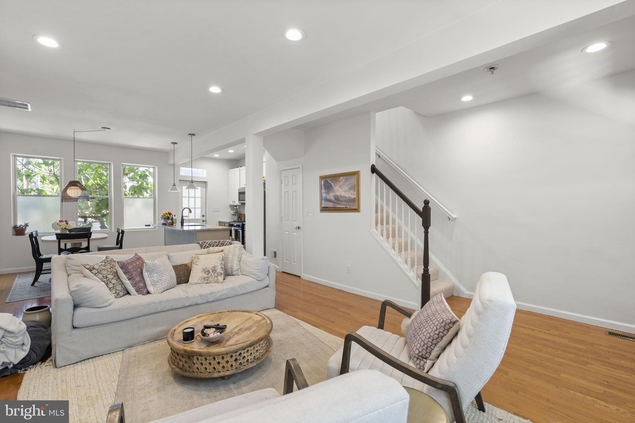 1712 M Street Northeast Washington, DC 20002 - Photo 9 of 38 a living room with furniture and a large window