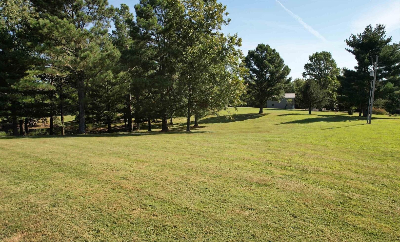 0 Dylan Drive Marion, IL 62959 - Photo 4 of 7 a view of a swimming pool with an outdoor space and seating area