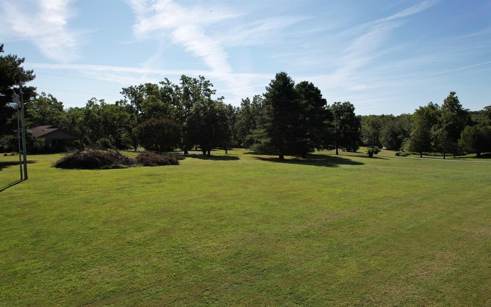 0 Dylan Drive Marion, IL 62959 - Photo 5 of 7 a view of a field with trees in the background