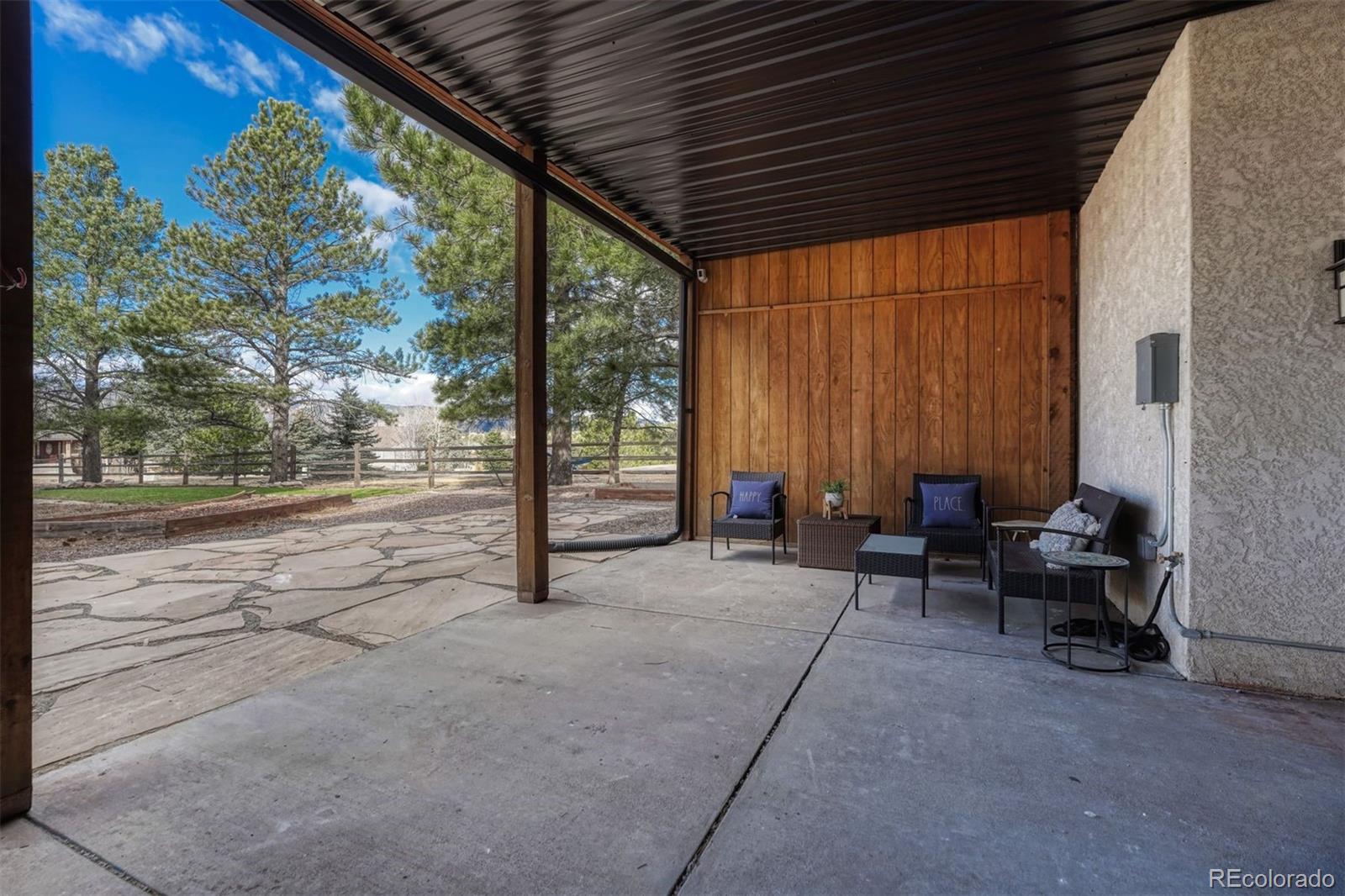 17870 New London Road Monument, CO 80132 - Photo 40 of 44 a view of backyard with seating space