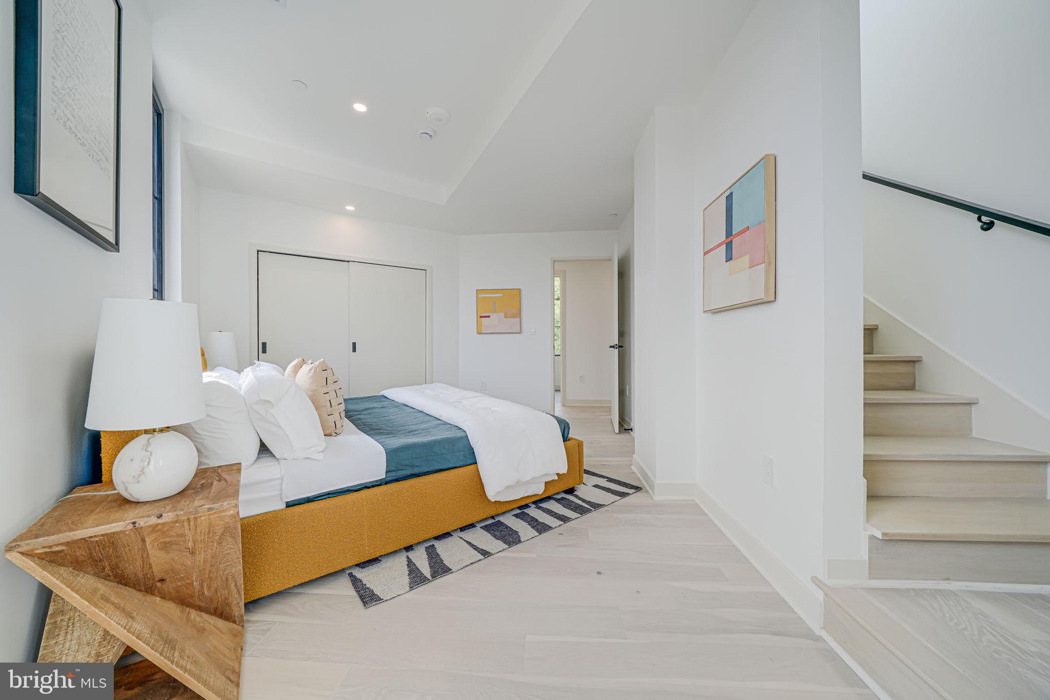 2901 Newark Street Northwest Washington, DC 20008 - Photo 12 of 52 a bedroom with a bed and window