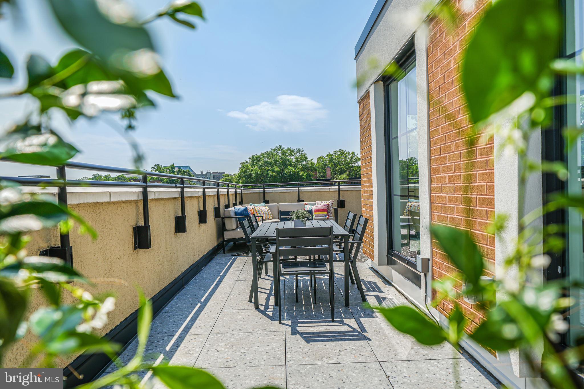 2901 Newark Street Northwest Washington, DC 20008 - Photo 21 of 52 a view of a balcony with chairs