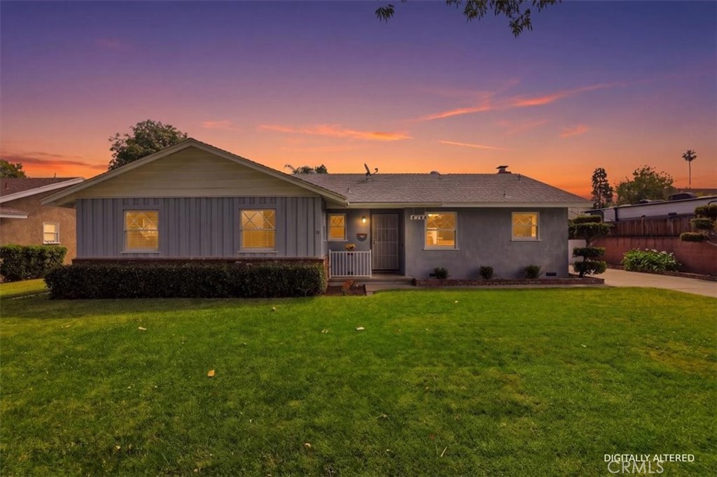 6766 Nicolett Street Riverside, CA 92504 - Photo 1 of 1 Front of home at twilight