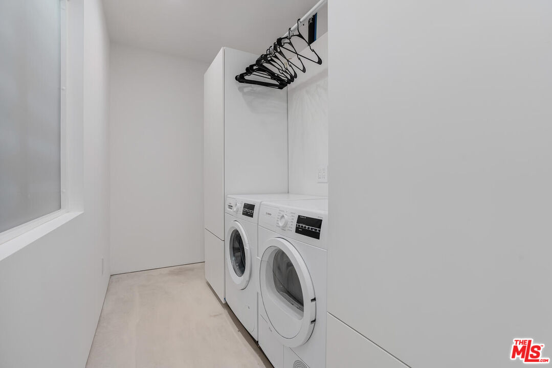 Undisclosed Address Los Angeles, CA 90064 - Photo 11 of 25 a utility room with dryer and washer