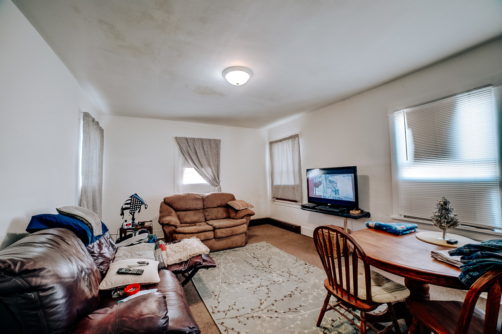 215 South 3rd Street Watseka, IL 60970 - Photo 13 of 17 a view of a workspace with furniture and a window