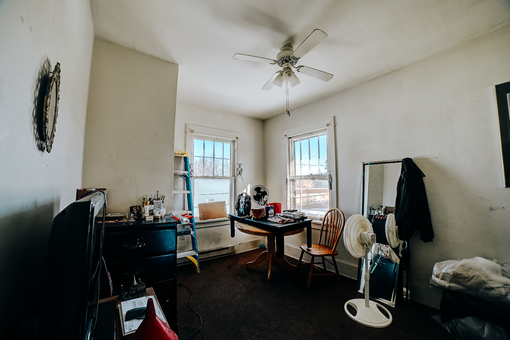215 South 3rd Street Watseka, IL 60970 - Photo 17 of 17 a view of a workspace with furniture and a window