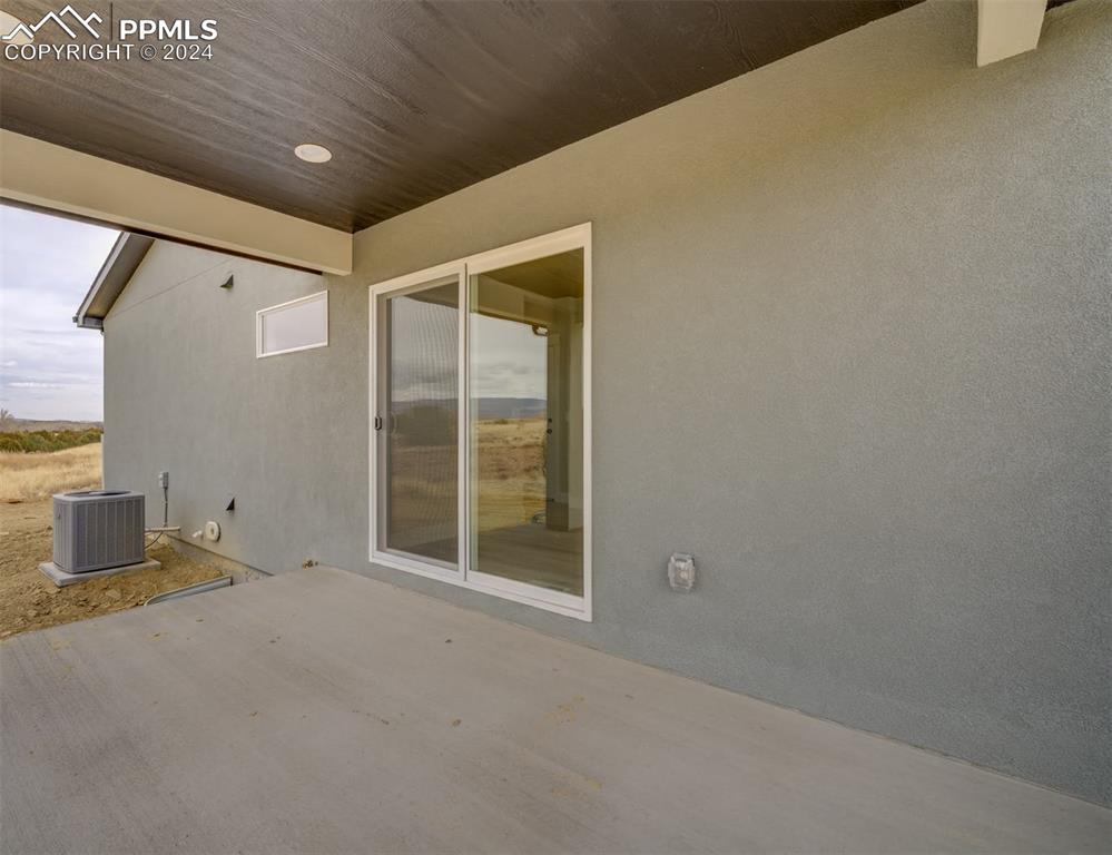 205 High Meadows Drive Florence, CO 81226 - Photo 45 of 49 a view of an empty room with a window