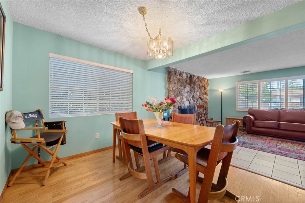 15410 Runnymede Street Van Nuys, CA 91406 - Photo 11 of 22 a view of a dining room with furniture window and outside view
