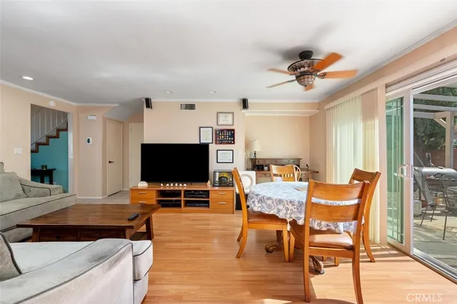 a outdoor living space with furniture and a flat screen tv