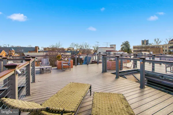 a view of a terrace with seating area