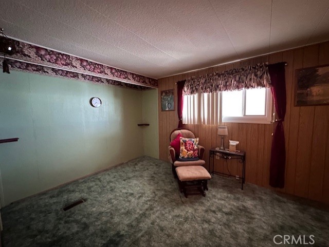 701 Montara Road, Unit 53 Barstow, CA 92311 - Photo 14 of 21 a living room with furniture and a window