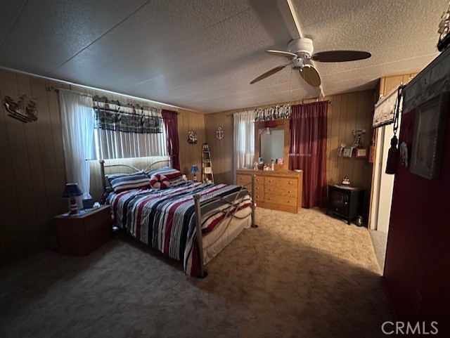 701 Montara Road, Unit 53 Barstow, CA 92311 - Photo 17 of 21 a bedroom with a bed closet and a window