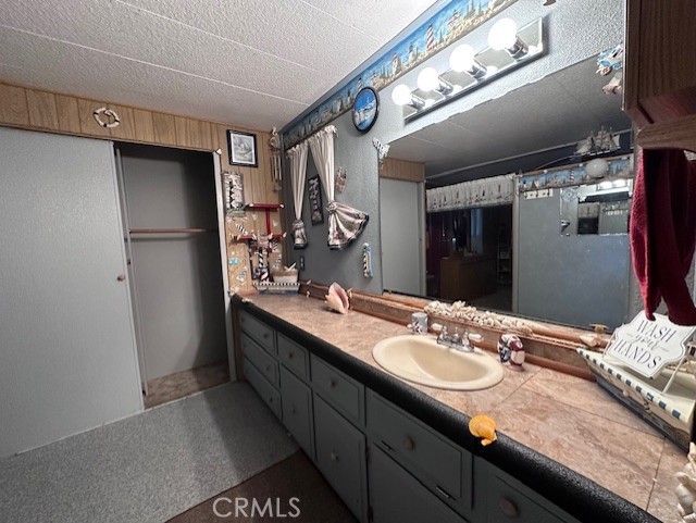 701 Montara Road, Unit 53 Barstow, CA 92311 - Photo 21 of 21 a bathroom with a sink double vanity and a mirror
