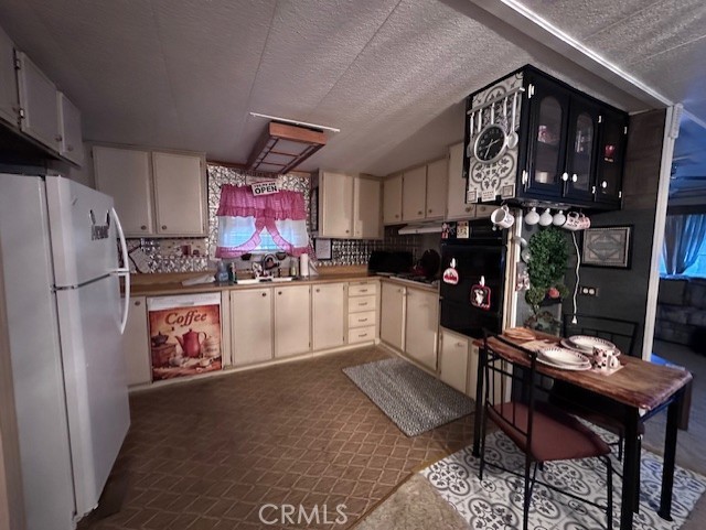701 Montara Road, Unit 53 Barstow, CA 92311 - Photo 9 of 21 a kitchen with granite countertop lots of counter top space