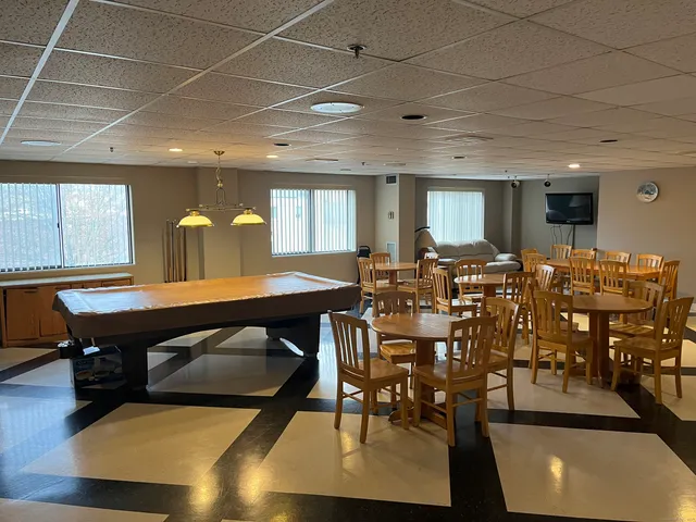 a view of a dining room with furniture