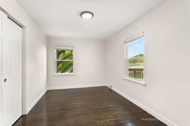 an empty room with windows