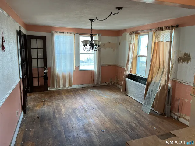wooden floor and windows in an empty room