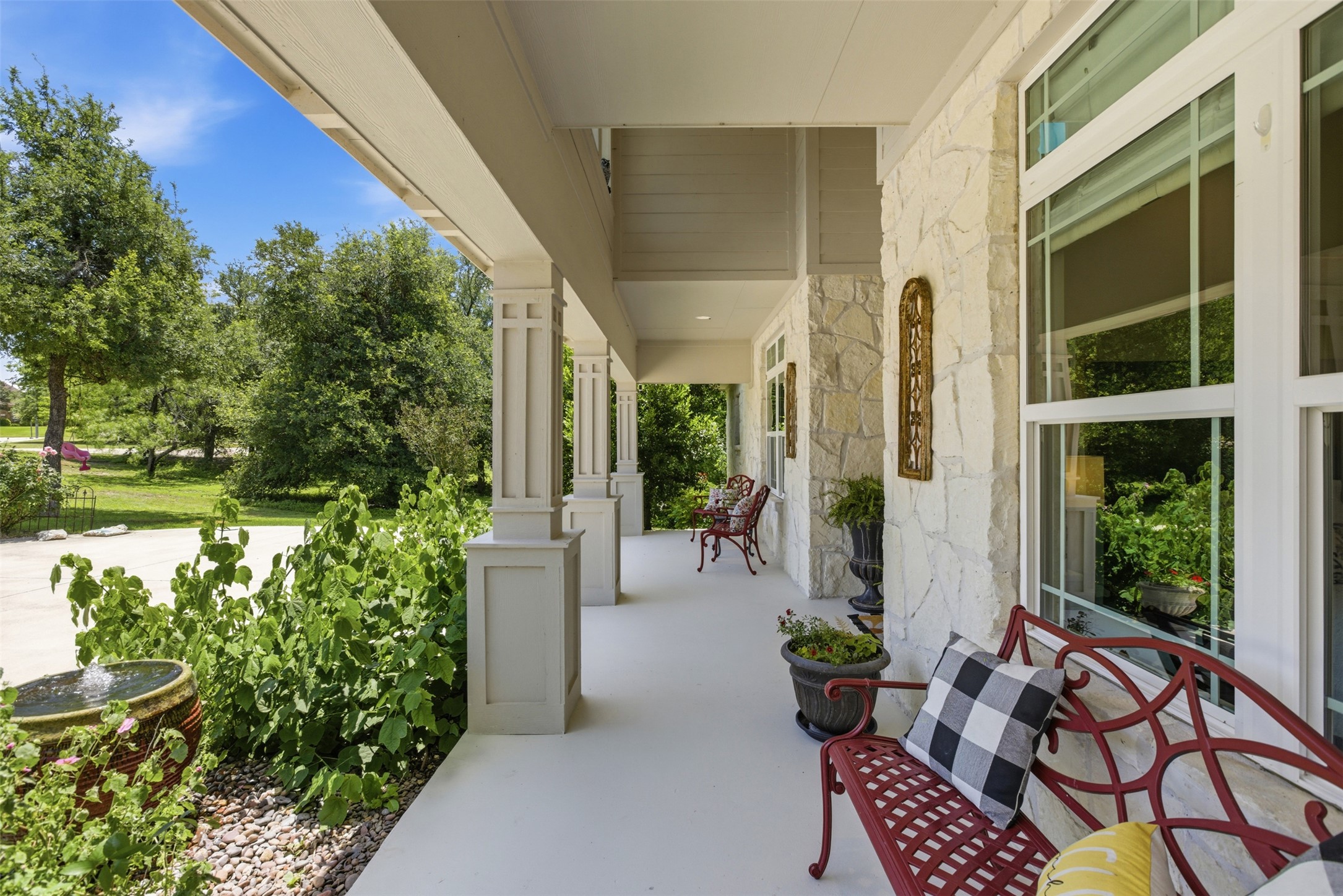 1804 Tanner Loop Taylor, TX 76574 - Photo 19 of 40 An inviting front porch surrounded by lush landscaping creates the perfect first impression.
