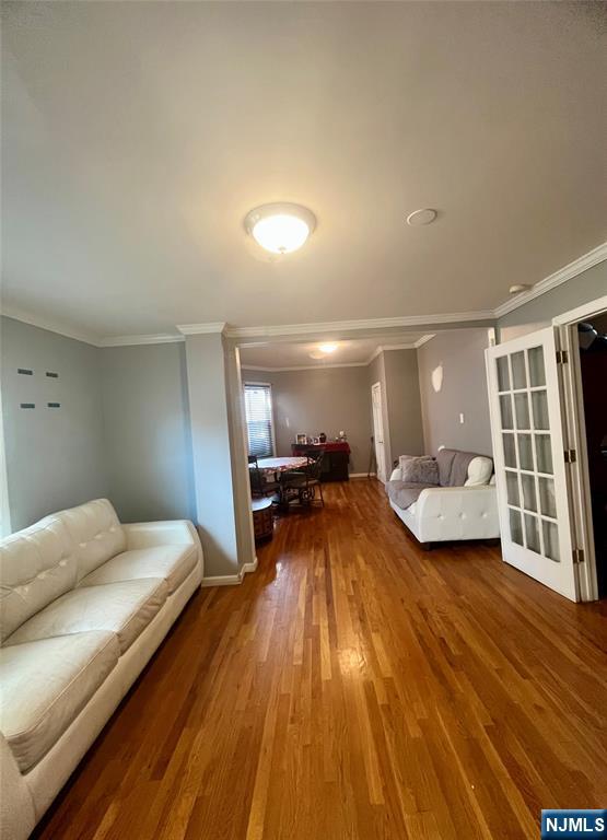 315 Coit Street Irvington, NJ 07111 - Photo 5 of 12 a bedroom with a bed and window