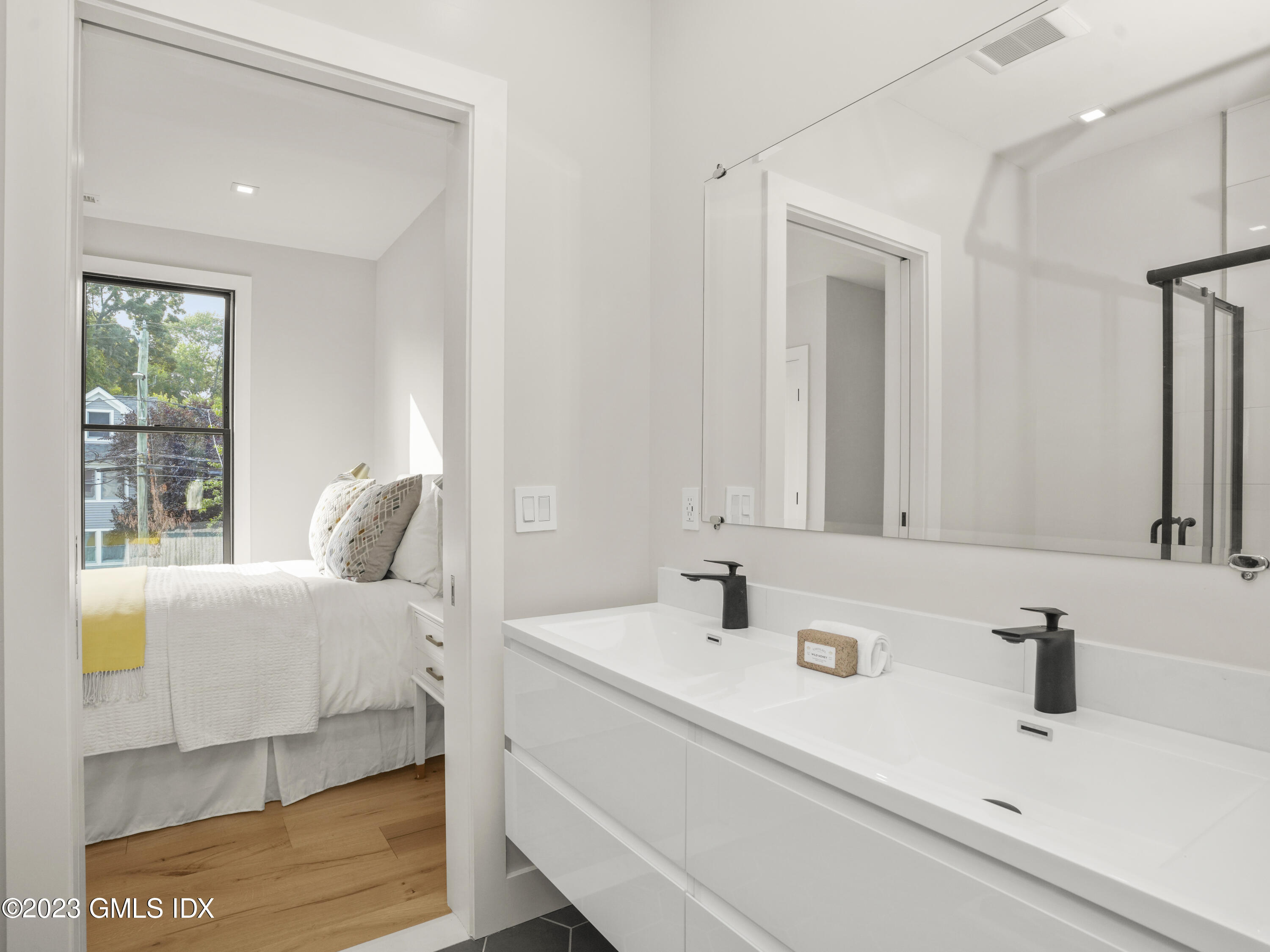 35 Bonwit Road Riverside, CT 06878 - Photo 13 of 20 a bathroom with a sink and a mirror