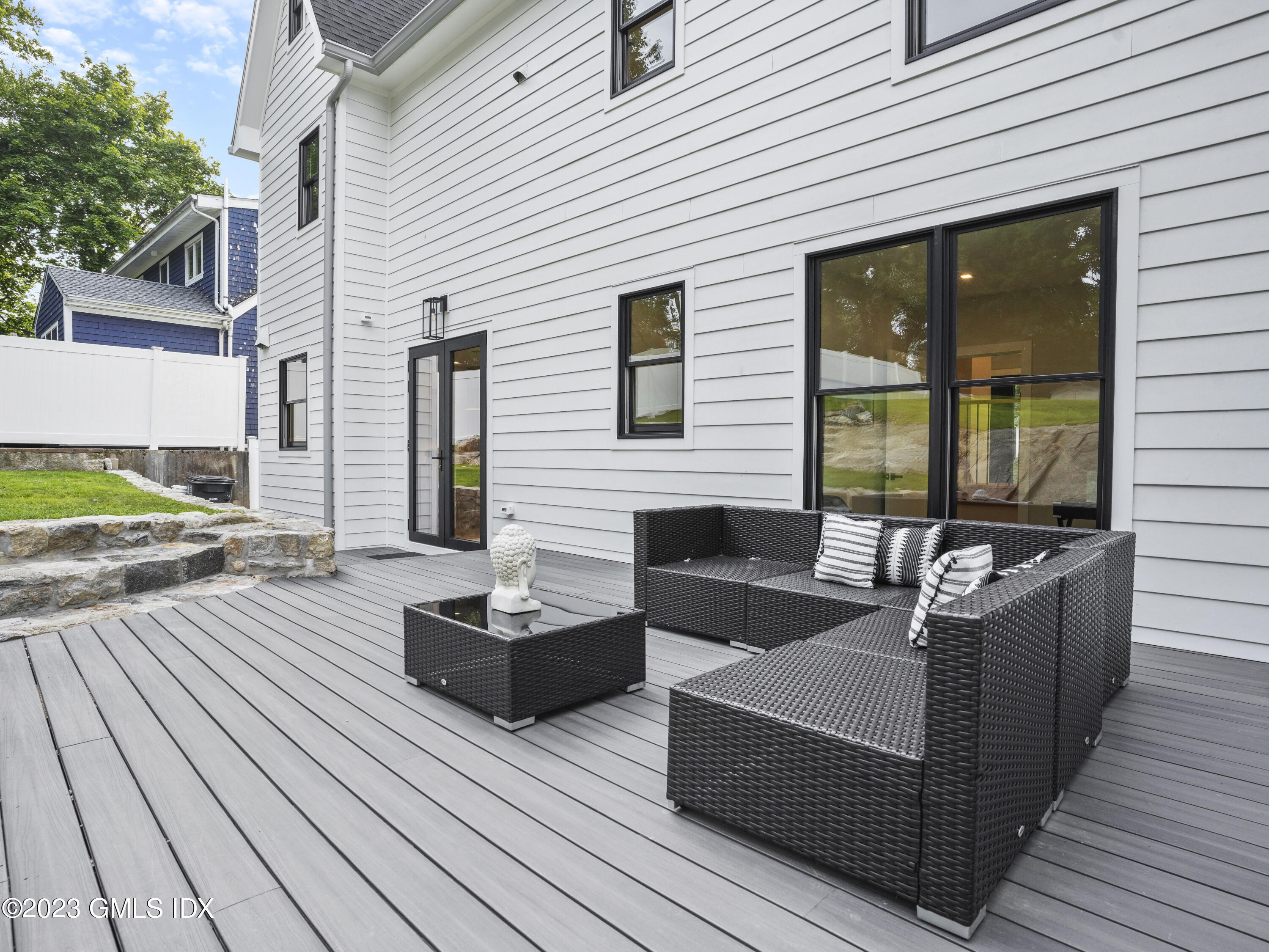 35 Bonwit Road Riverside, CT 06878 - Photo 16 of 20 a outdoor space with patio the couches and a potted plant on a patio
