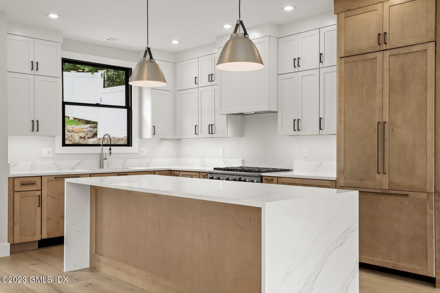 35 Bonwit Road Riverside, CT 06878 - Photo 5 of 20 a kitchen with stainless steel appliances granite countertop a refrigerator a sink and a stove