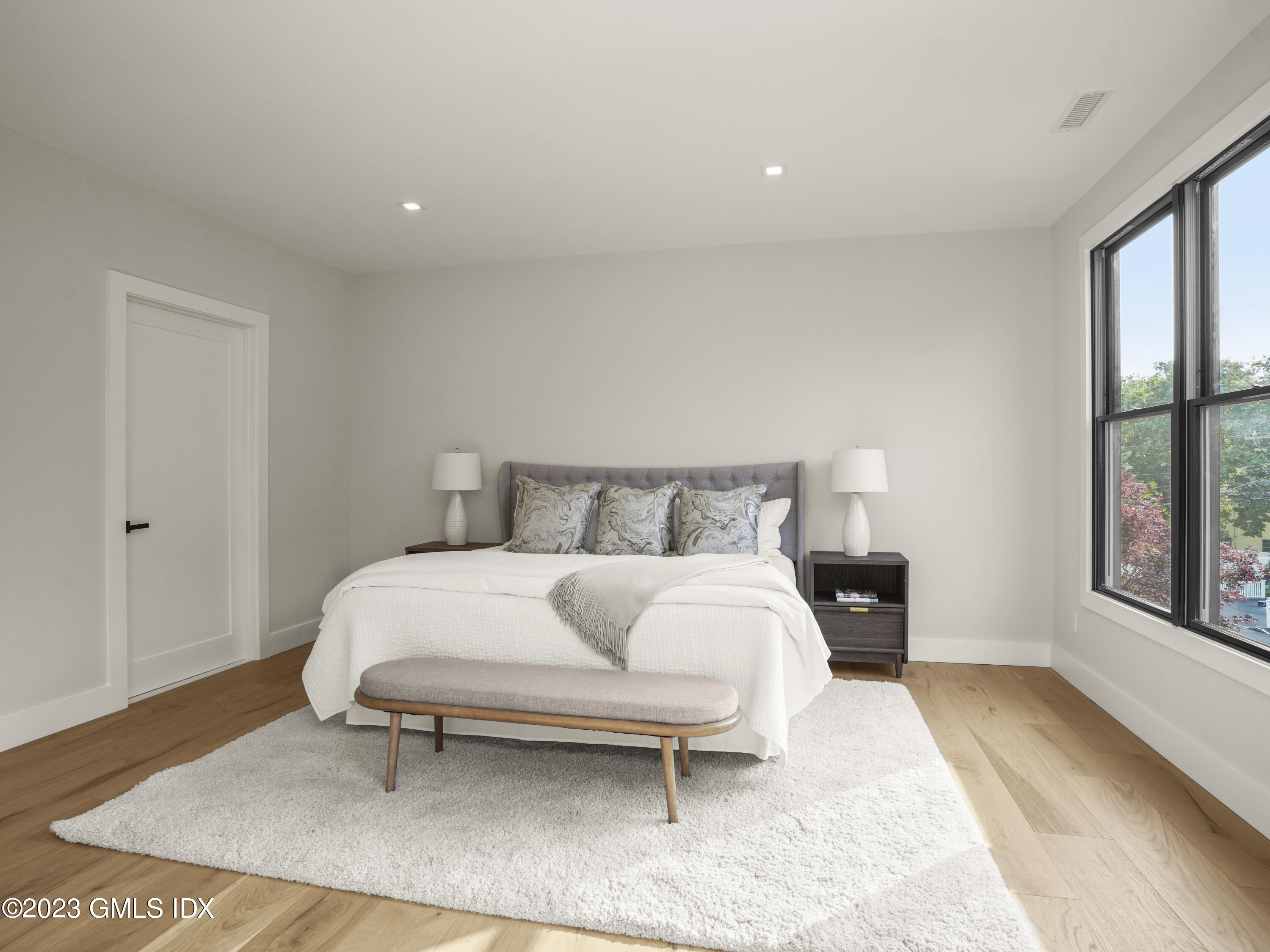 35 Bonwit Road Riverside, CT 06878 - Photo 9 of 20 a bedroom with a bed and a large window