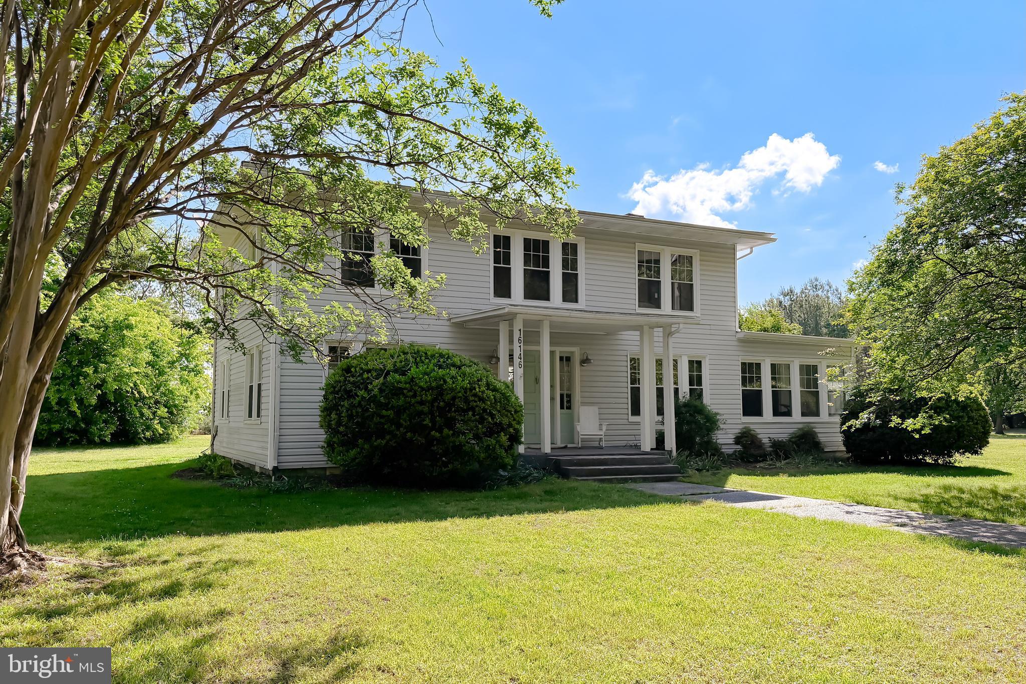 16146 Thomas Road Piney Point, MD 20674 - Photo 1 of 57 a front view of house with yard and green space