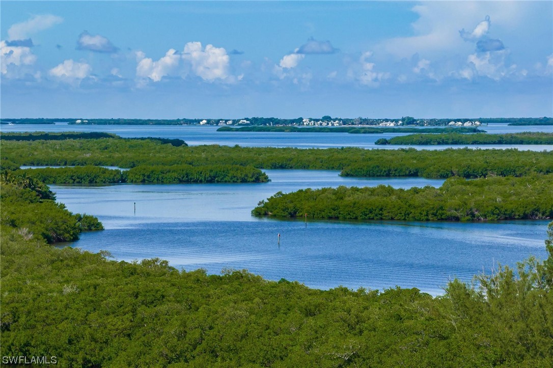 16641 Stringfellow Road, Unit 502 Bokeelia, FL 33922 - Photo 38 of 40 a view of a lake with outdoor space