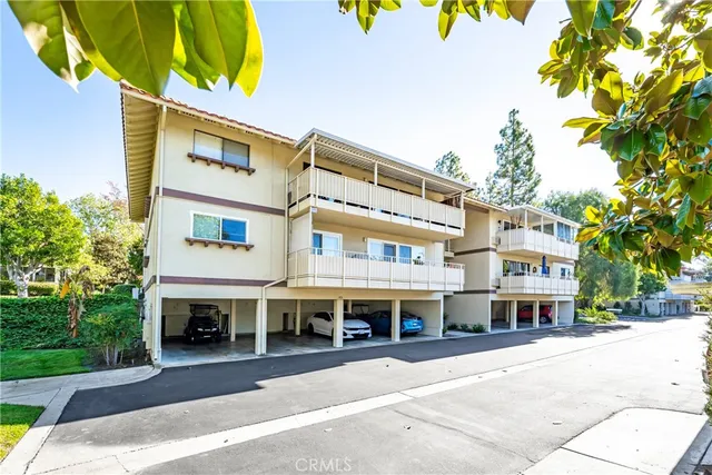 a front view of a building with street view